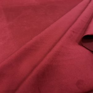 Velours ras uni couleur rouge théâtre