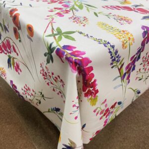 TOILE ENDUITE spécial nappage avec double enduction et anti tâches pour protéger des tâches. Joli motif FLEURS COLOREES TRES VIVES XXL REF VIRGINIE