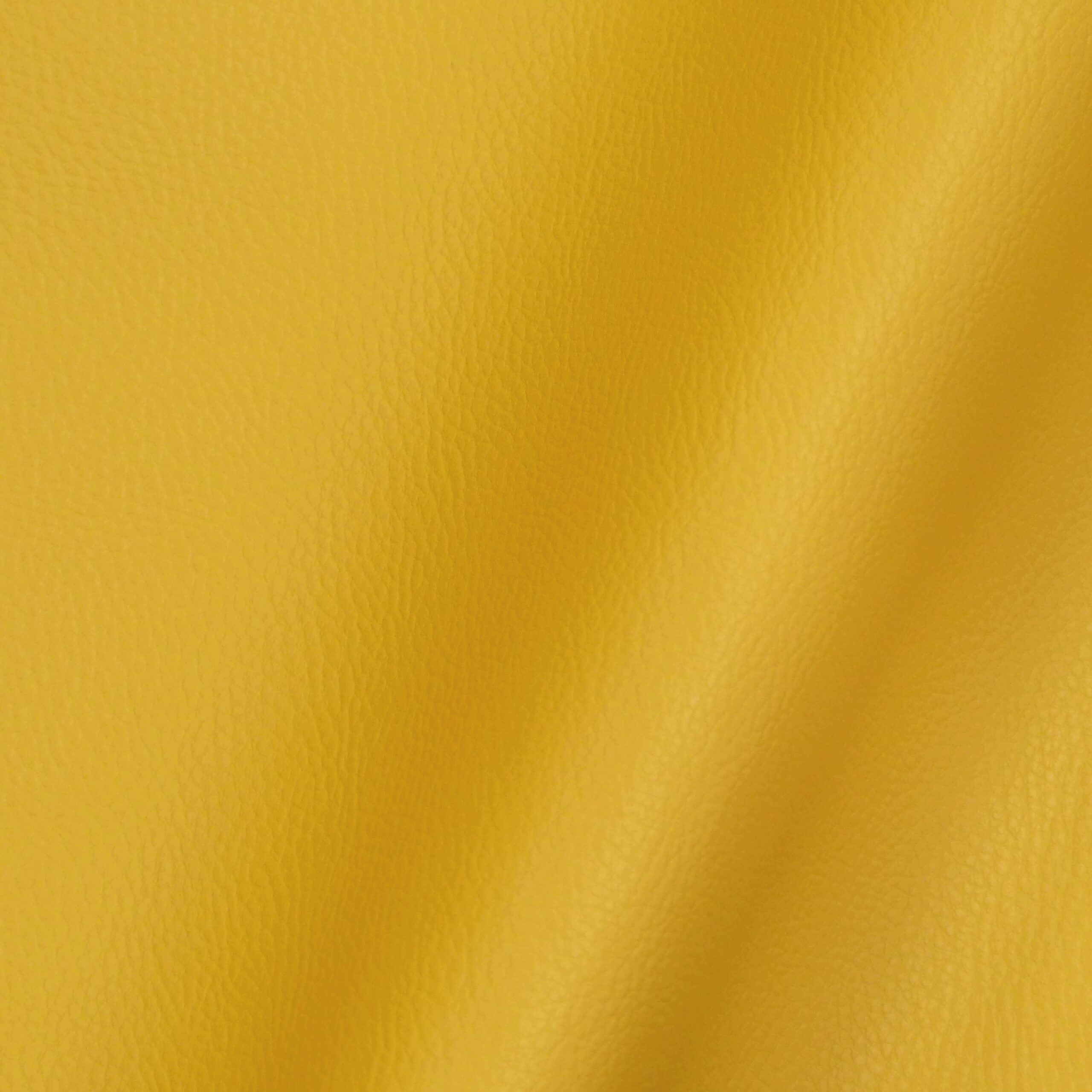 Tissu simili cuir uni couleur curcuma